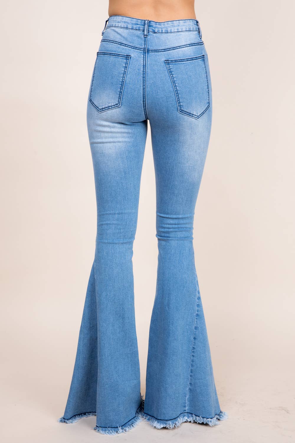 SOLID FLARED WESTERN INSPIRED JEANS WITH FRINGE